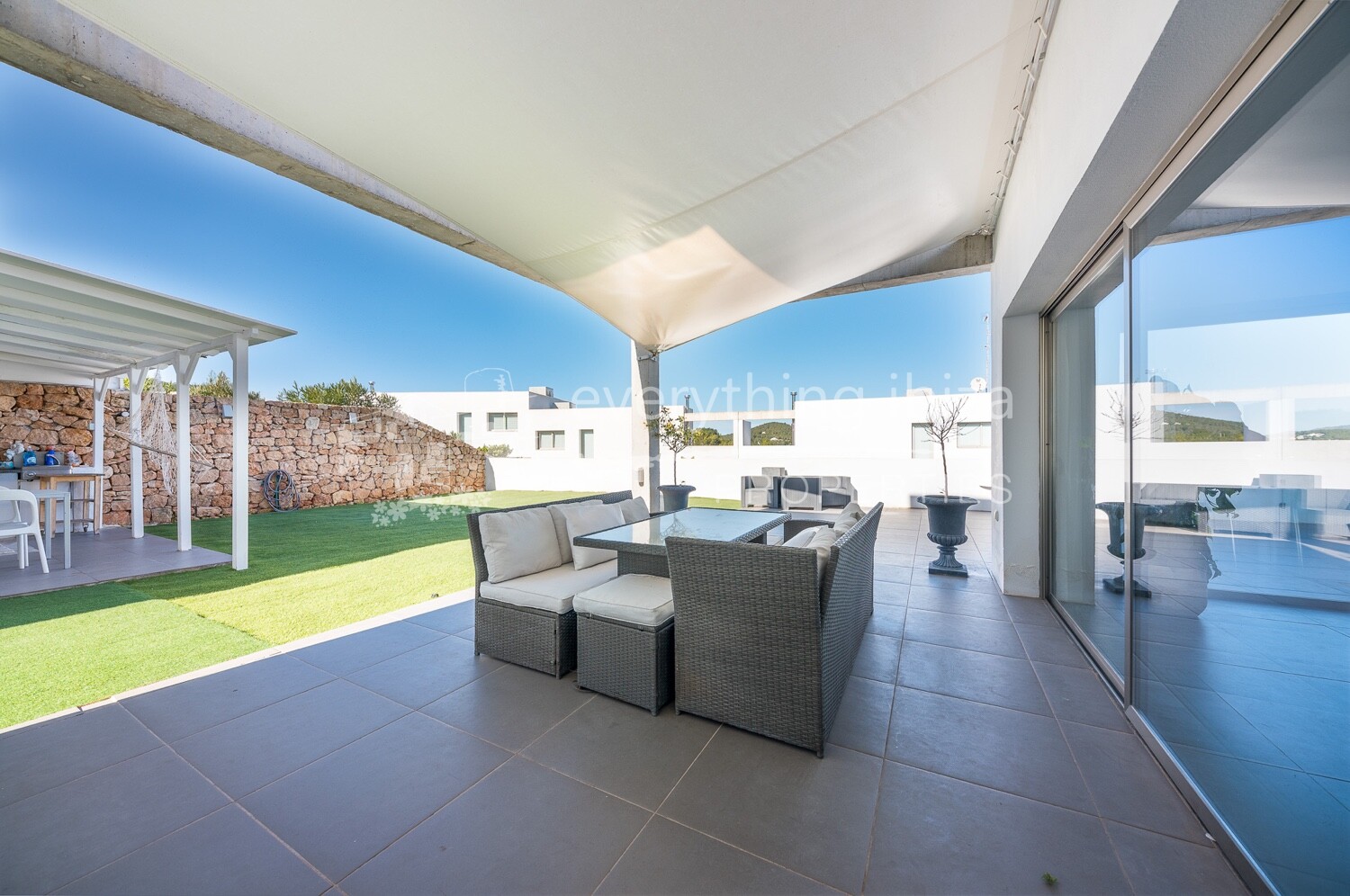 Elegant Modern Corner Townhouse in Stylish Roca Llisa, ref. 1504, for sale in Ibiza by everything ibiza Properties