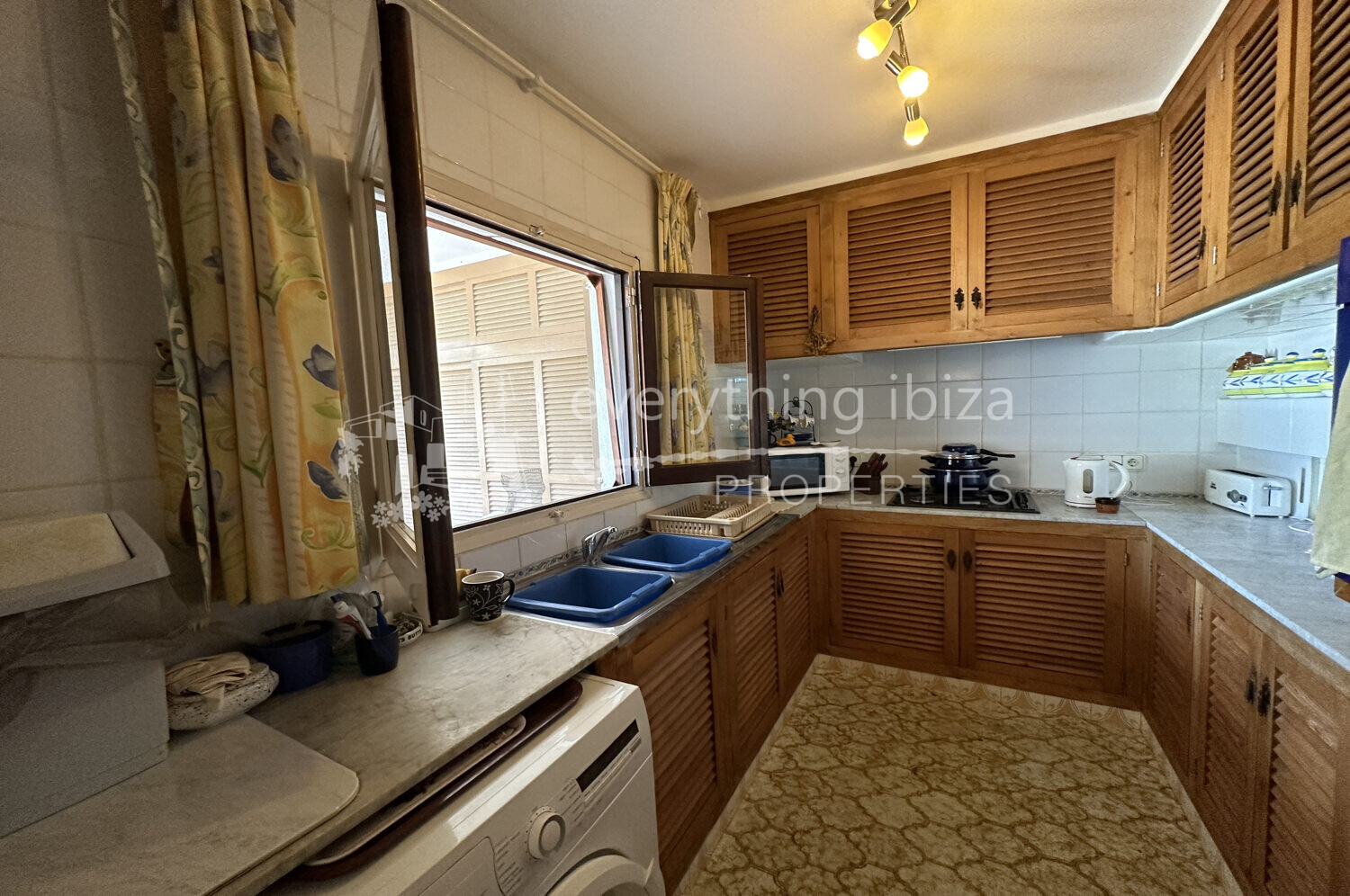 Charming Spacious Ground Floor Apartment with 78m2 Garden, ref. 1558, for sale by everything ibiza Properties