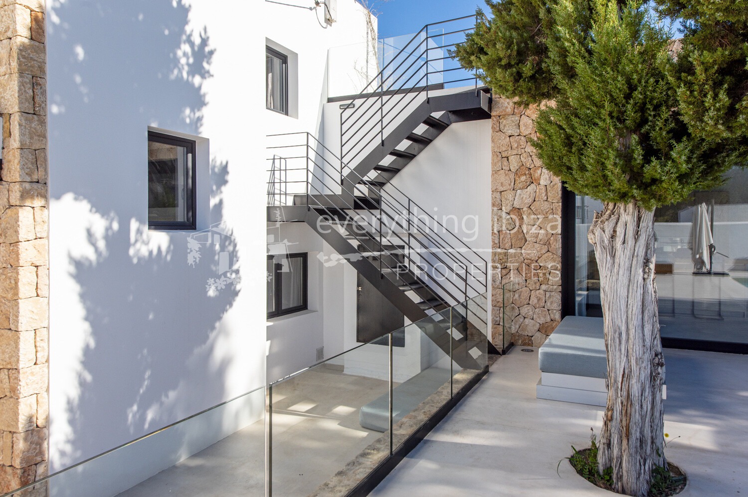 Stylish Contemporary Villa in Peaceful Setting near Beach with Sea and Sunset Views, ref. 1692, for sale in Ibiza by everything ibiza Properties