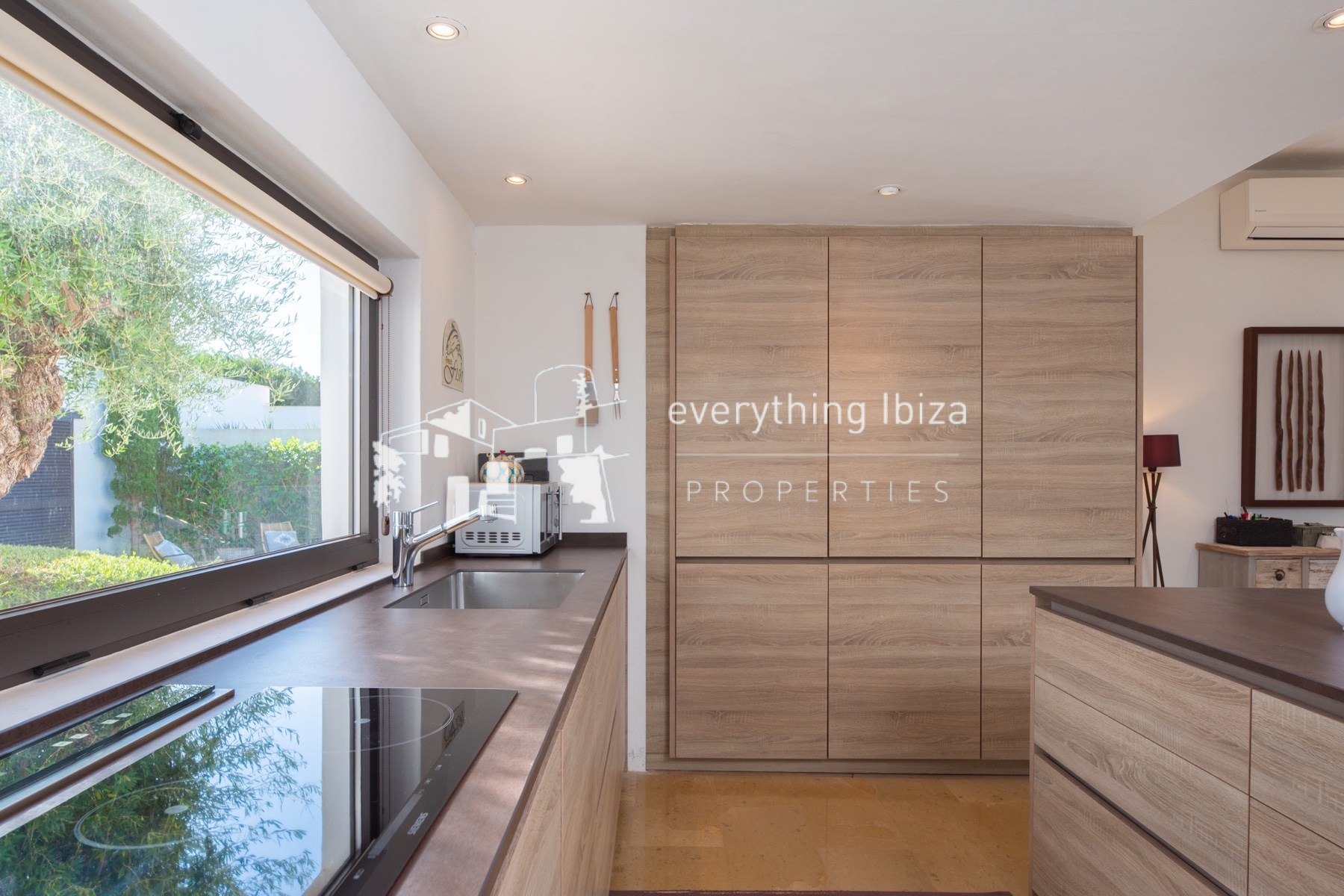 Contemporary elegance meets coastal luxury in this stunning sea-view villa with pool in Ibiza