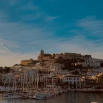Beach front marina in Ibiza for comparison to poolside villas